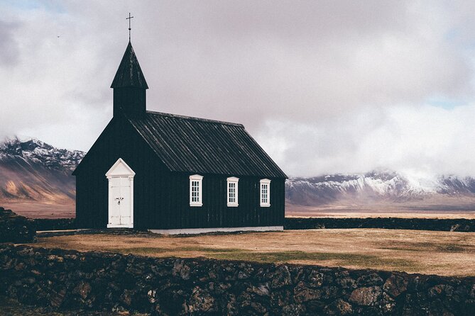 Epic Snæfellsnes Adventure with Lava Cave Small-Group Day-Tour - Ingjaldshólskirkja: the red-roof church with glacier-and-field views