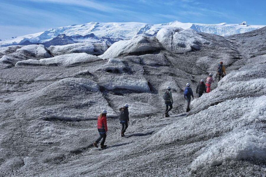 From Jökulsárlón: Ice Cave and Glacier Exploration Tour - Getting geared up for cold, wind, and real traction