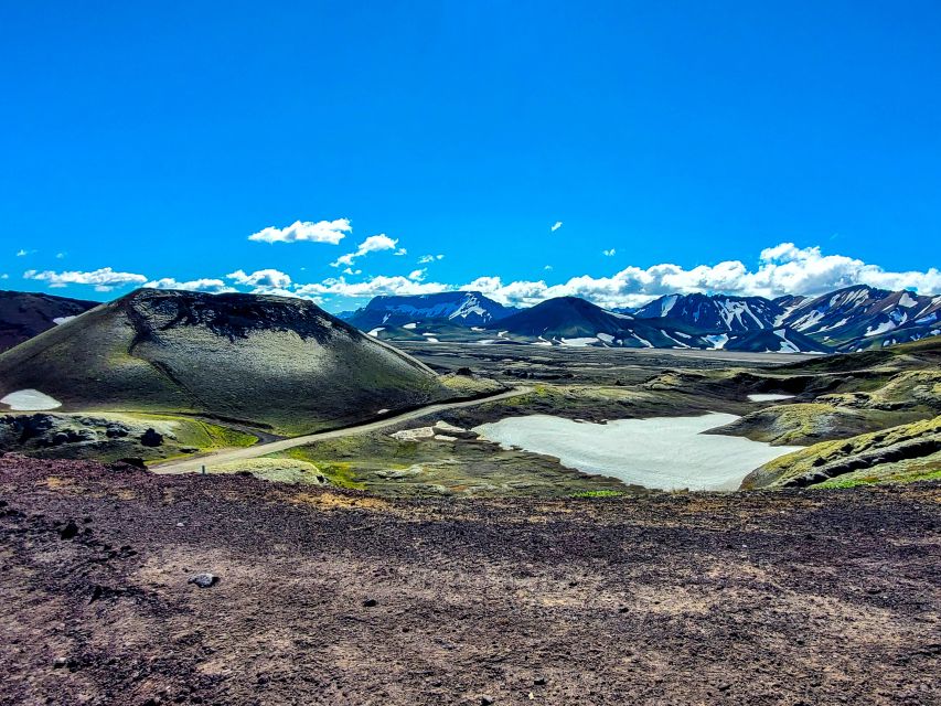 From Reykjavik: Day Tour to Landmannalaugar in a 4X4 - Hjálparfoss Waterfall Stop: The Finish That Feels Like A Reward