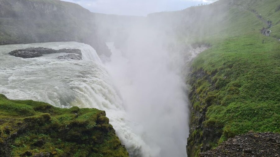 From Reykjavík: Golden Circle Route & Hvammsvik Hot Spring - Kerið Crater: red volcanic bowl and the lake at the bottom