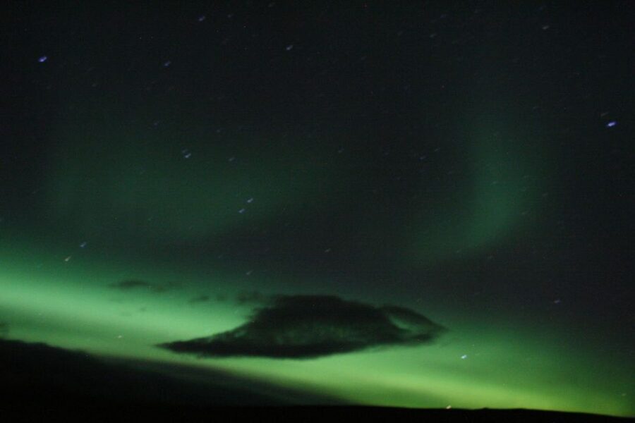 From Reykjavik: Northern Lights Boat Cruise - Staying warm on deck: overalls, cabins, and smart timing