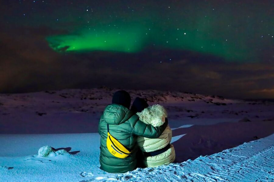 From Reykjavik: Northern Lights Bus Tour with Hot Cocoa - Kerið crater and other stop styles, depending on the night
