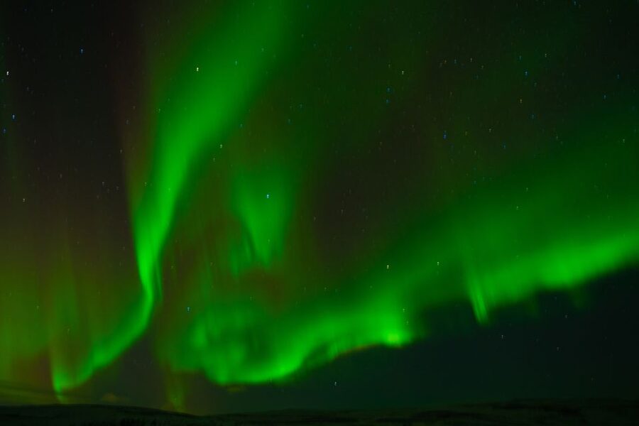 From Reykjavik: Northern Lights Guided Tour with Photos - The cold-comfort setup: blankets, hot drinks, snacks, and stargazing