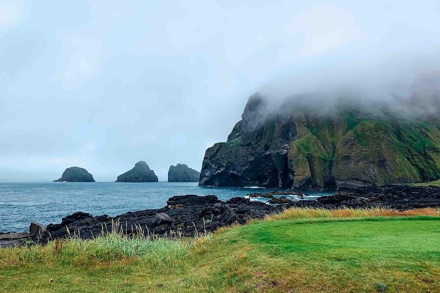 From Reykjavik: Puffin and Volcano Tour in Westman Islands - Skansinn, The Fort: Viking Wood Church and harbor views