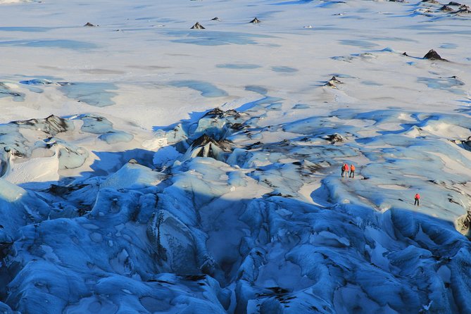 Glacier Hike and South Iceland Sightseeing from Reykjavik - Reynisfjara black sand beach: sea stacks, basalt columns, and wave timing
