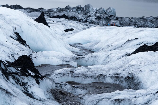 Glacier Hike Experience on Sólheimajökull - Meet on location - Crampons and safety gear: the moment the tour clicks