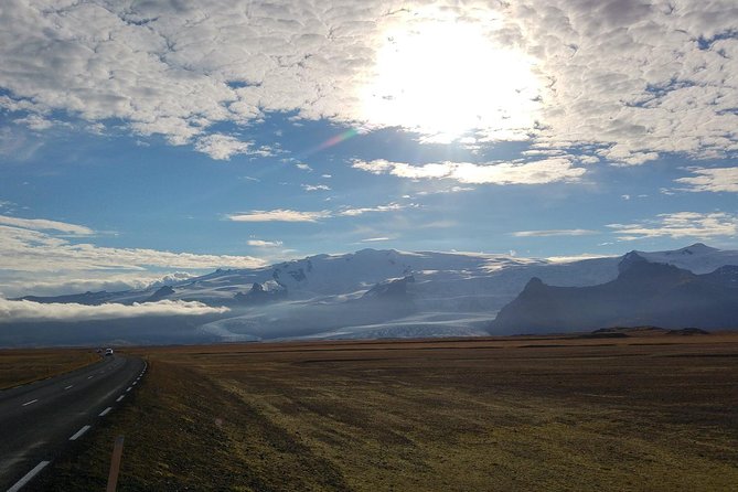 Glacier Lagoon, Diamond Beach, Black Sand Beaches and Waterfalls - Vík viewpoint and the church area: end with high-angle perspective