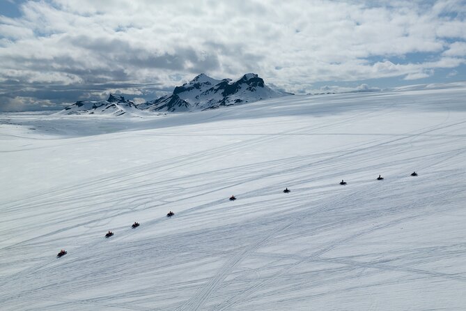 Glacier Snowmobiling and Natural Ice Cave Tour from Reykjavik - One hour of snowmobiling on Langjökull, adrenaline with guardrails