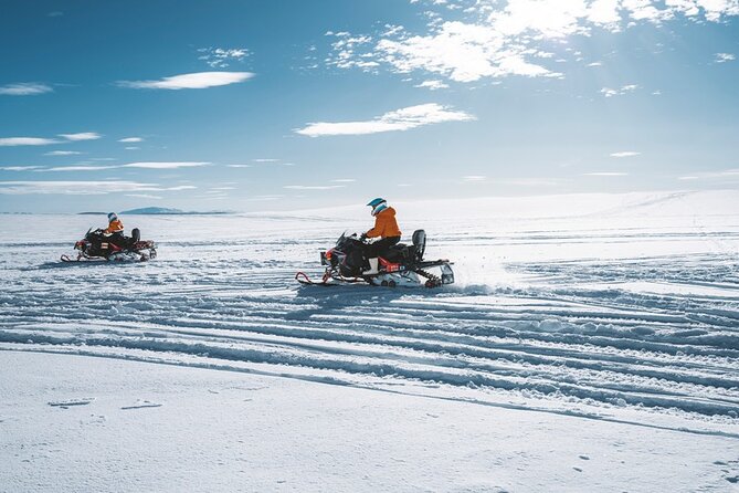 Glacier Snowmobiling and Natural Ice Cave Tour from Reykjavik - Natural ice cave time, cool visuals and real cave conditions