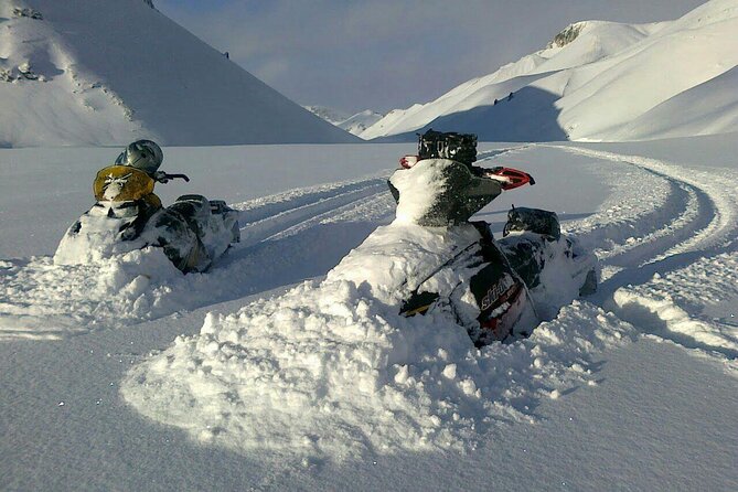 Golden Circle Super Jeep Adventure with Snowmobiling on Glacier - One-hour snowmobiling at Langjökull: gear, safety, and throttle time