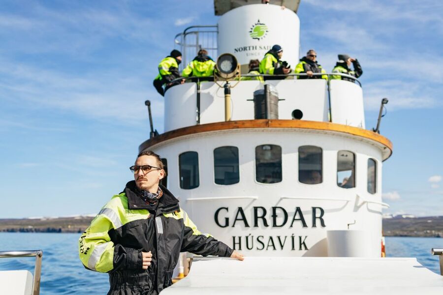 Húsavík: Whale Watching Tour with Guide - Staying warm without overpacking: overalls, hats, gloves, and hot drinks