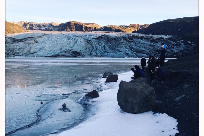 Iceland South Coast Full Day Small-Group Tour from Reykjavik - Sólheimajökull glacier: striped ice and a volcanic setting