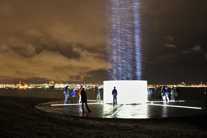 Imagine Peace Tower Tour on Viðey island | John Lennon tribute - Cold-weather comfort: hot chocolate, flash lights, and crampons