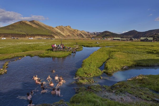 Landmannalaugar Hiking, Haifoss Waterfall and Hot Springs Tour - Stop 1: Hjálparfoss and the Turquoise Pool at Basalt Walls