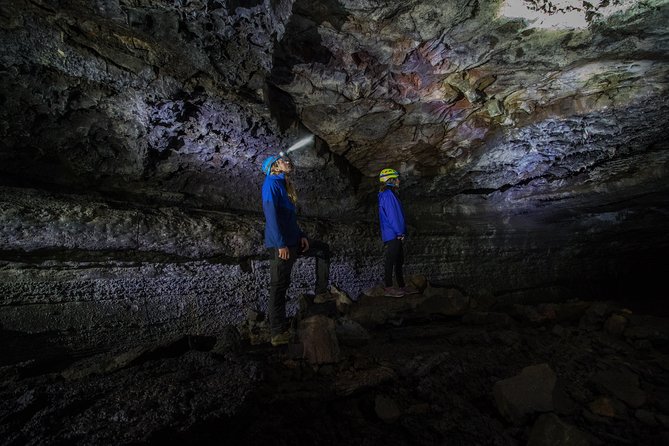 Lava Tunnel Caving & Snorkeling in Silfra with Transfer | Free Photos - Leidarendi lava tunnel caving: 900 meters of rock, helmet on, and crawl comfort