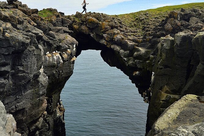 Private Snæfellsnes Peninsula day tour with 6+ Attractions - Lóndrangar basalt cliffs: seabirds, ruined volcano shapes, and clear-day rewards