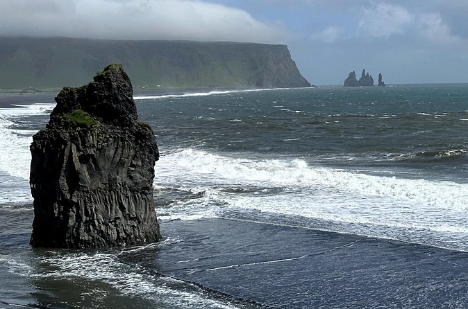 Private South Coast tour - Dyrhólaey and Reynisfjara: bird cliffs, basalt columns, and black sand drama