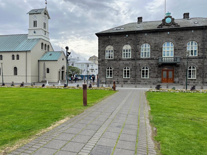 Reykjavik: City Walking tour in Small Group with Local Guide - Pace, comfort, and weather-proofing on an all-walk route