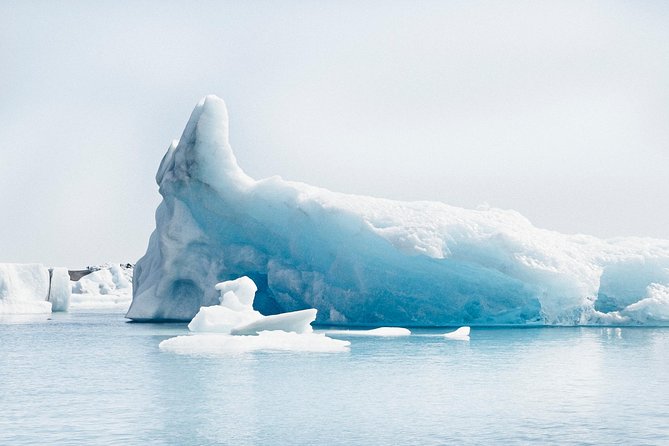 Reykjavik: Glacier Lagoon Boat Ride & South Coast Full Day Tour - Vík: quick coastal taste, food stop, and sea stacks if you get clear skies