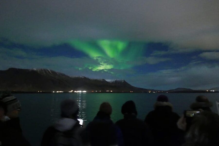 Reykjavik: Northern Lights Guided Boat Tour with Photos - Key highlights you’ll feel right away