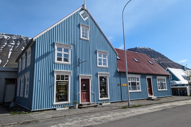 Self-Guided Tour of Ísafjörður: Art, History, and Architecture - Fishermen’s Monument and the 3D Crosswalk: Bronze Gravitas, Street Art Play