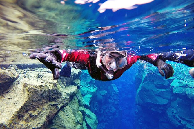 Silfra Drysuit Snorkeling Tour with Free Photos - From Reykjavik - Stop 1 at Silfra Adventure Vikings, getting suited up like a pro