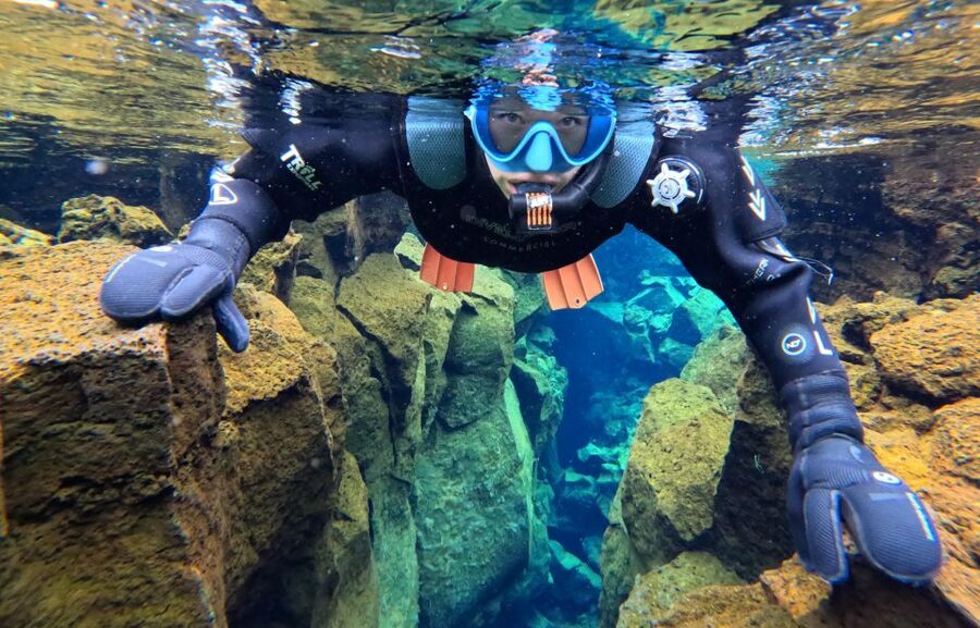 Silfra: Fissure Snorkeling Tour with Underwater Photos - From warm layers to a tight dry suit: what it feels like