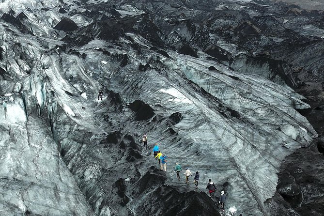 Solheimajokull Glacier 3-Hour Small-Group Hike - What You See: Eyjafjallajökull Views, Eerie Quiet, and Photo Stops