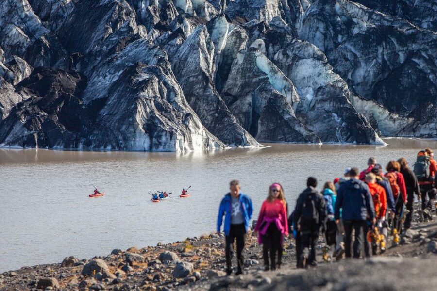 Sólheimajökull: Guided Kayaking Tour on the Glacier Lagoon - Getting kitted at Sólheimajökull Base Camp, parking lot to wetsuit-ready