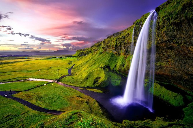 South Coast - Private - Stop 2: Skogafoss, wide, powerful, and rainbow-friendly on sunny days