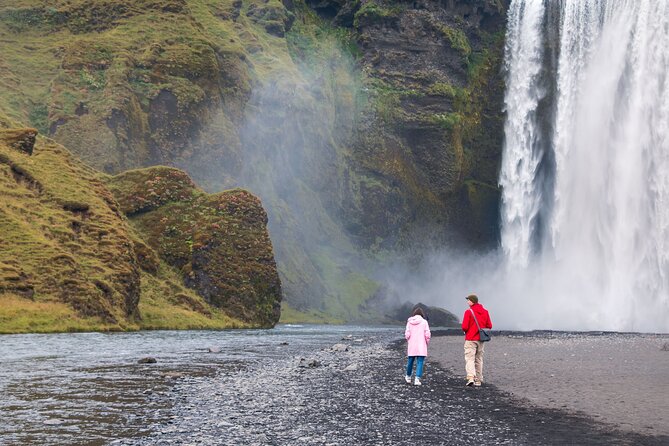 South Iceland, Glacier and Black Sand Beach Small Group Tour - Stop One: Seljalandsfoss and the Misty Walk Behind the Falls